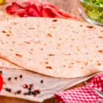 Come preparare una base per pizza leggera? Il trucco con poco lievito